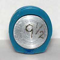 For a precise and comfortable fit we make our rings in 1/4 size increments. Shown here is the first step, cutting and sizing the wax.